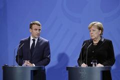 Франция и Германия отказались наказывать Россию санкциями