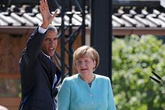 Обама и Меркель выступили за продление антироссийских санкций