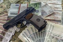 При обыске у врио премьер-министра Дагестана изъяли золотой пистолет ТТ