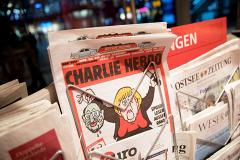 Charlie Hebdo посмеялся над химической атакой в Сирии (ФОТО)