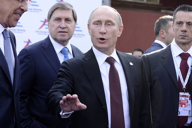 В Милане Путин грубовато отшутился на вопрос о падении рубля