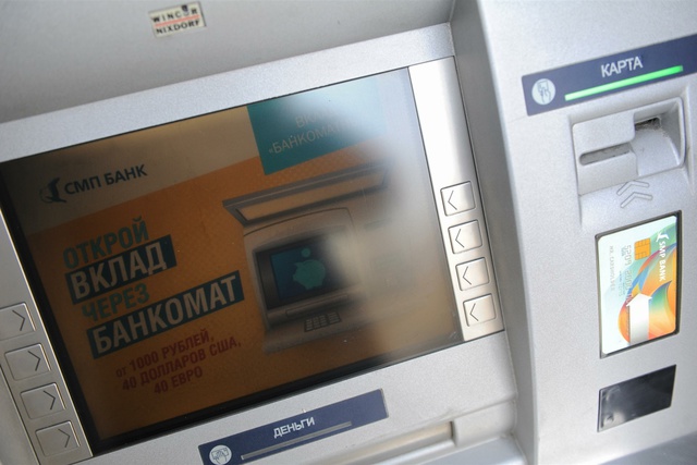 В московских отделениях банка «Траст» выстроились очереди