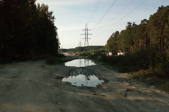 Жители Академического сбросились на ремонт дороги