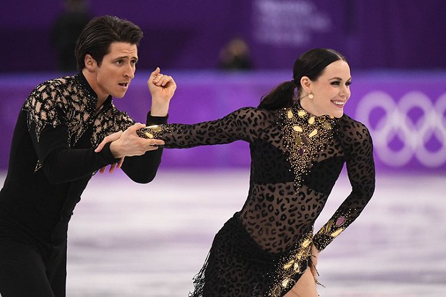 Фигуристы Тесса Вирчу и Скотт Моир стали трехкратными олимпийскими чемпионами